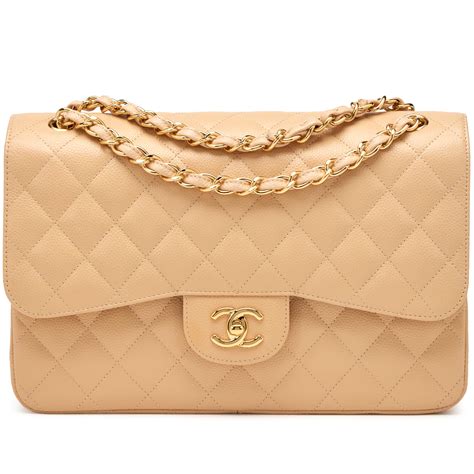 CHANEL Caviar Quilted Jumbo Double Flap Beige.